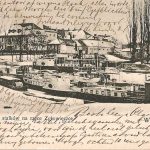 klein haventje met bisschopspaleis op de achtergrond